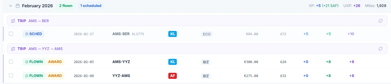SkyStatus Flight Ledger February 2026: AMS-YYZ KLM Business and YYZ-AMS Air France Business, both with AWARD badge